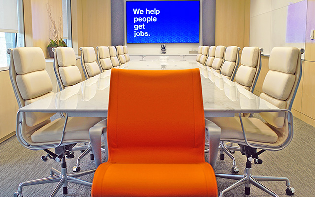 Indeed orange chair in a conference room