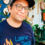 David smiling, wearing his Latinx in Tech tshirt